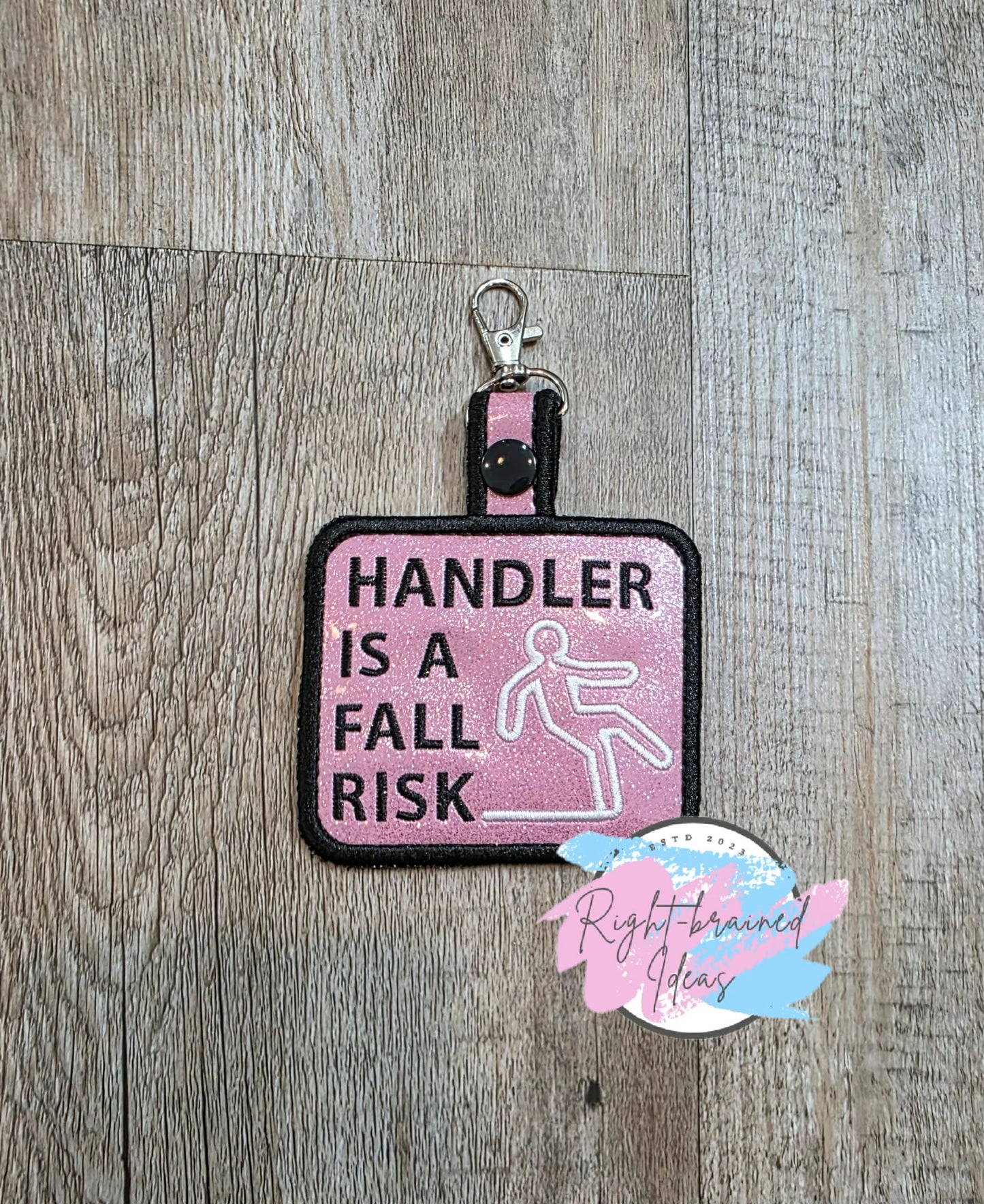 Handler Is A Fall Risk Black And White On Sparkle Light Pink Vinyl Patch Tab