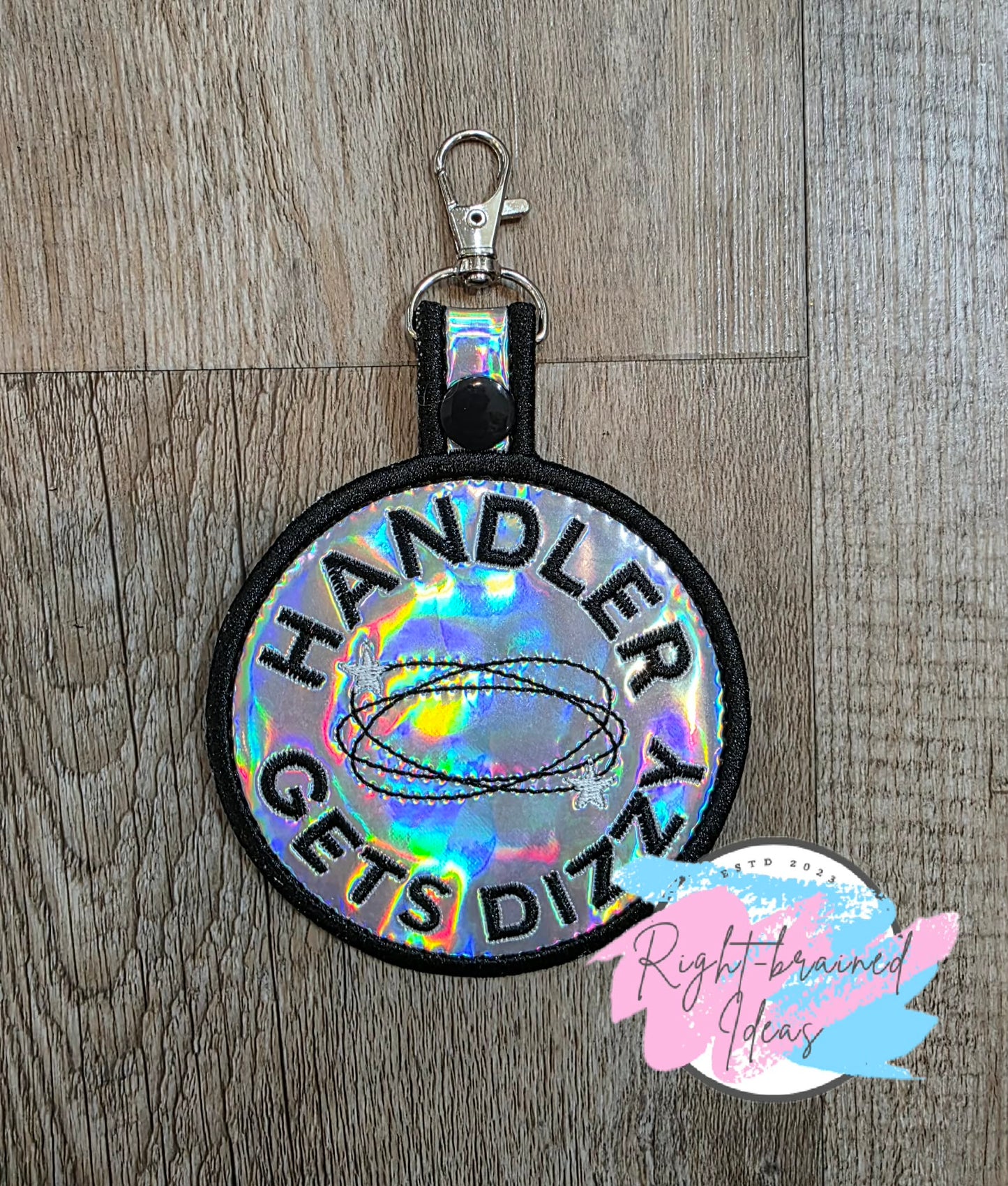 Handler Gets Dizzy Black And White On Silver Holographic Vinyl Patch Tab
