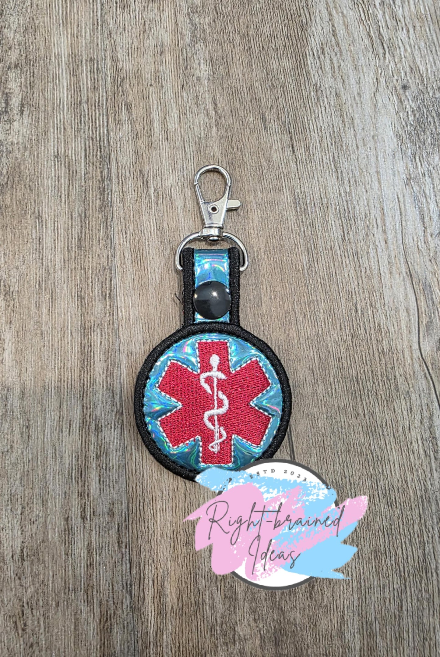 Medical Symbol Red, White and Black on Teal Blue Holographic Vinyl Mini Patch Tab