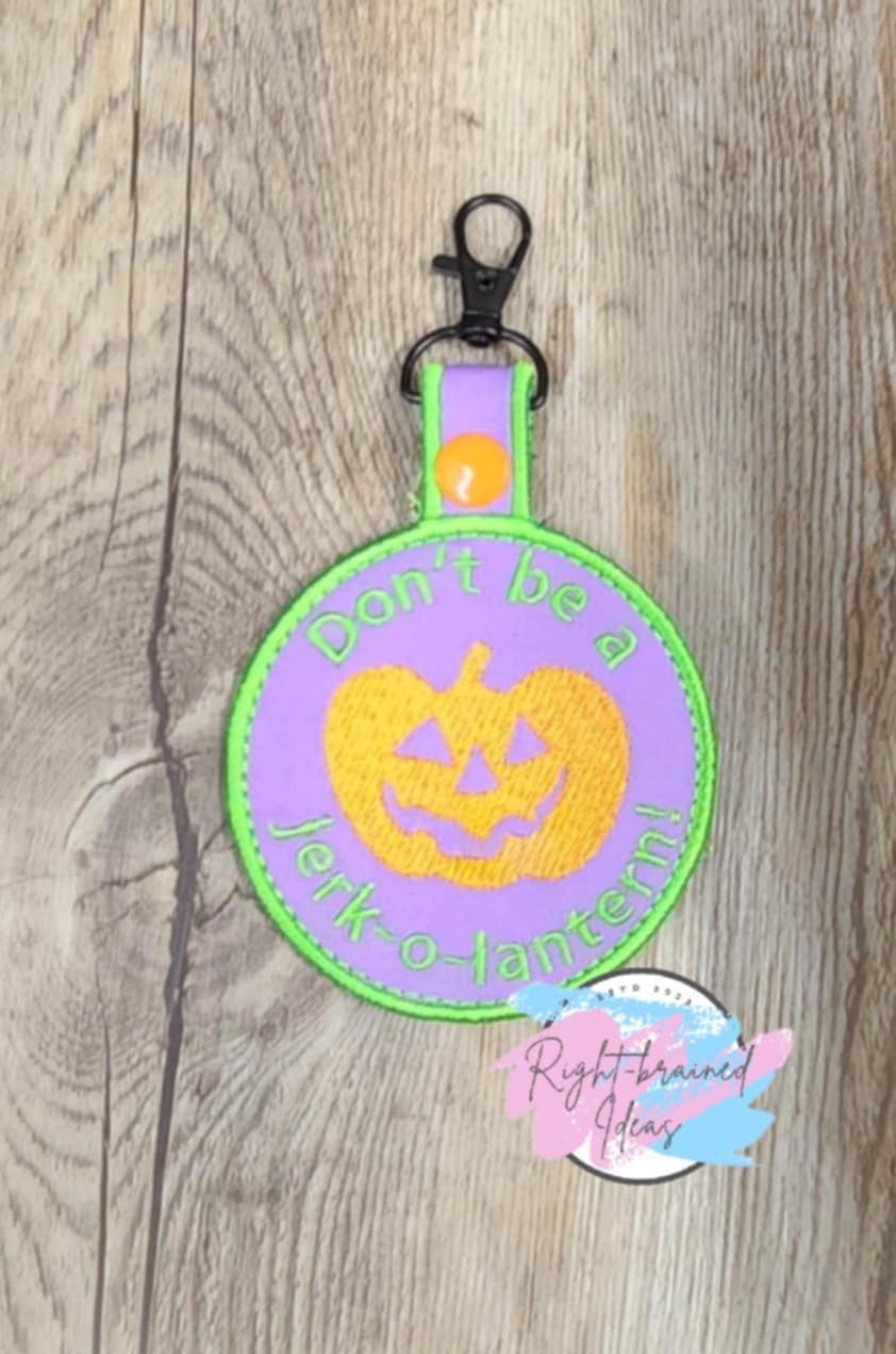 Don't be a Jerk-O-Lantern Purple Canvas with Orange and Neon Green Embroidery Thread
