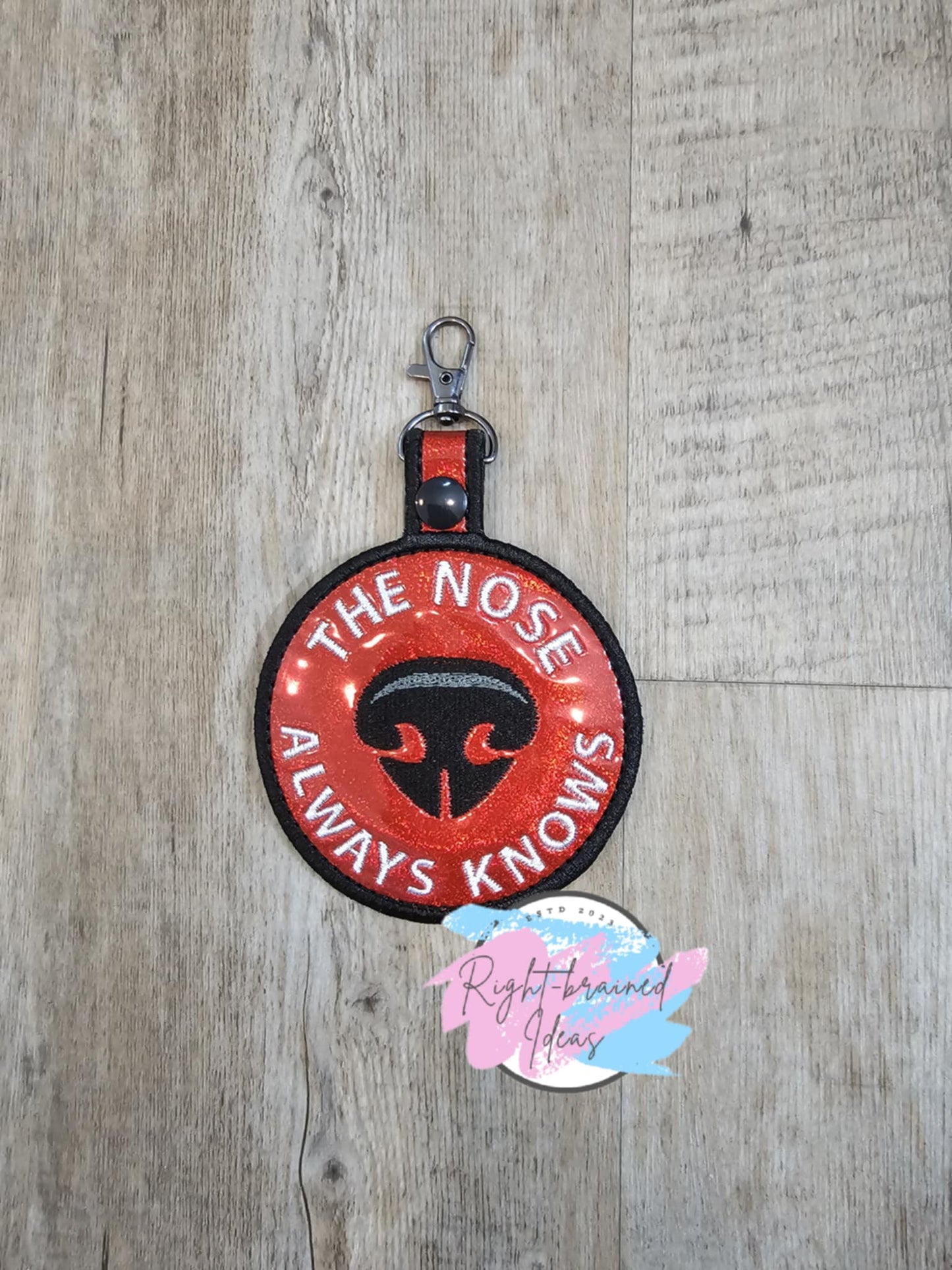 The Nose Always Knows Black on Sparkle Red Holographic Vinyl Patch Tab