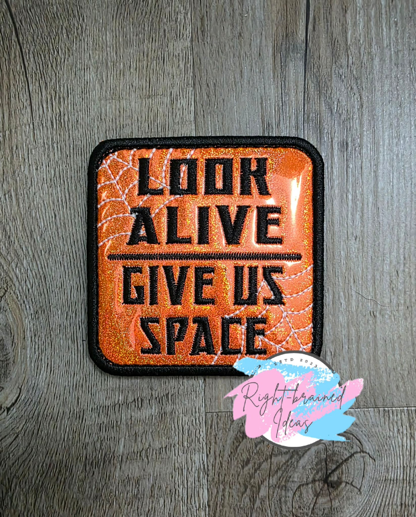 Spooky Season Inspired Working Dog Black And Glow-In-The-Dark White On Sparkle Neon Orange Holographic Vinyl Four-piece Patch Set