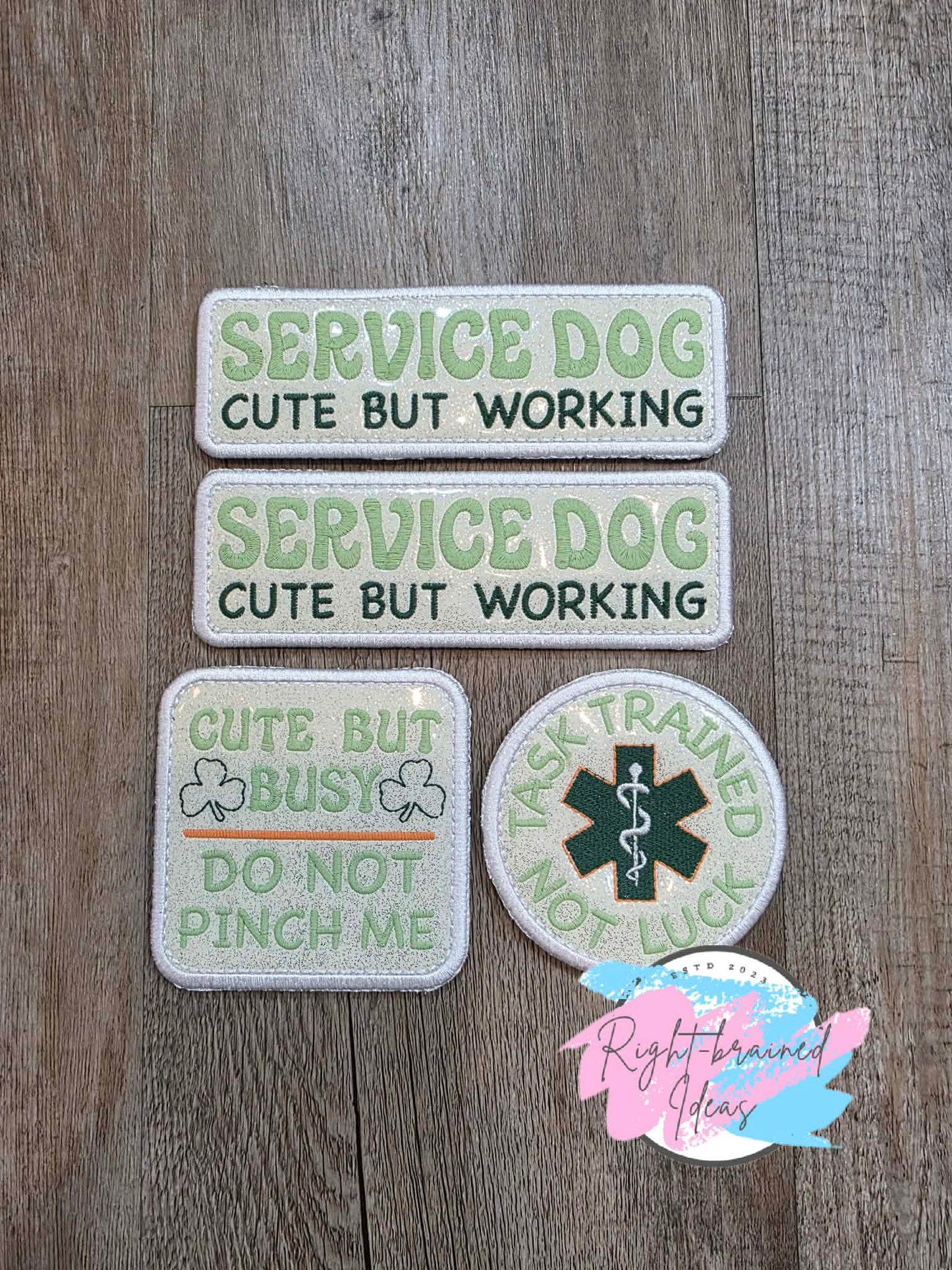 Shamrock Inspired Service Dog Cute But Working Flat Matt Mint Green, Flat Matt Forest Green, Flat Matt Orange And White On Sparkle White Vinyl Four-piece Patch Set