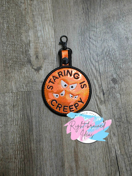 Creepy Crawly Inspired Staring is Creepy White And Black On Sparkle Neon Orange Holographic Vinyl Patch Tab