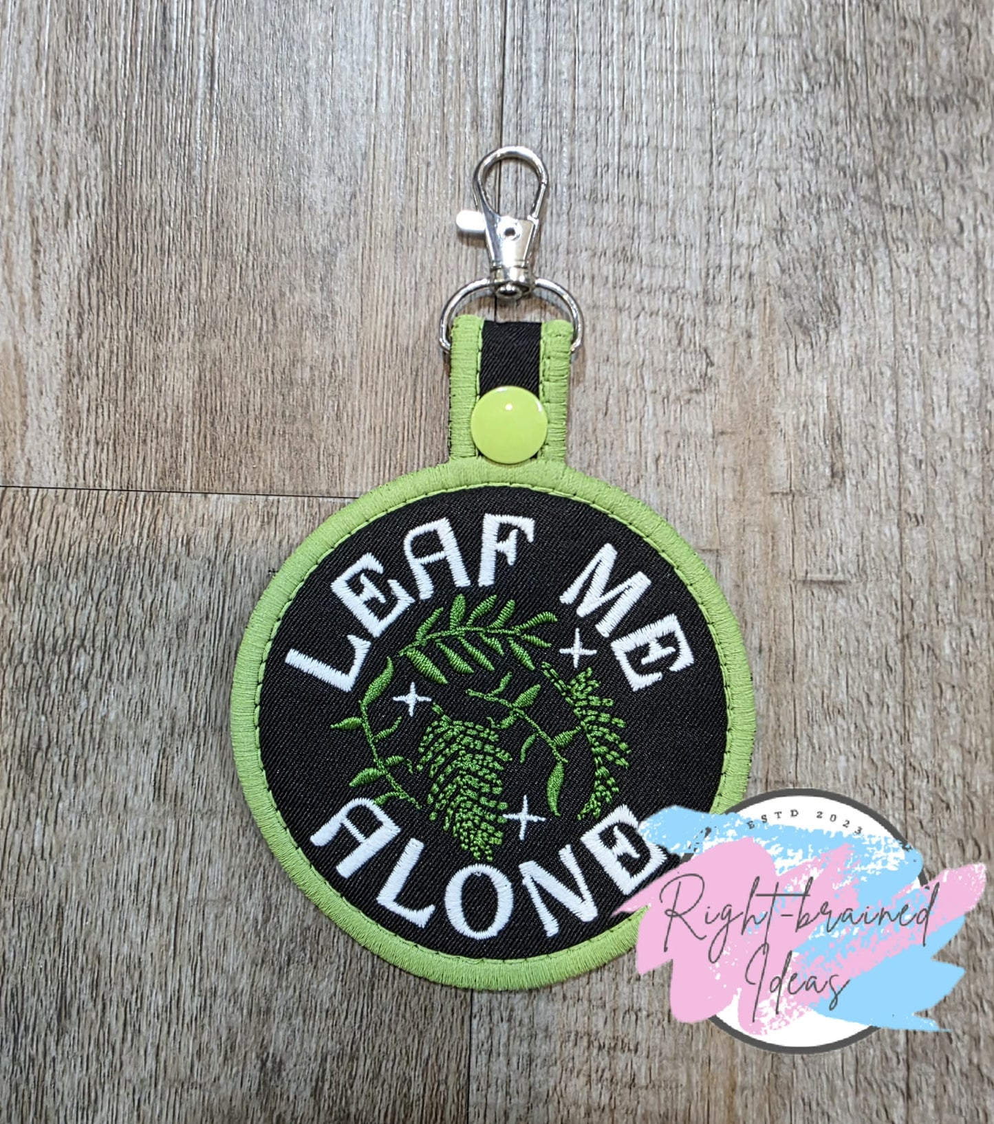 *Minor Stitch Flaw* Leaf Me Alone Flat Matt Light Green/White And Satin Green On Lightweight High Performance Black Twill Patch Tab