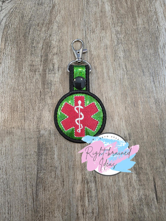 Medical Symbol Red, White and Black on Sparkle Green Holographic Vinyl Mini Patch Tab