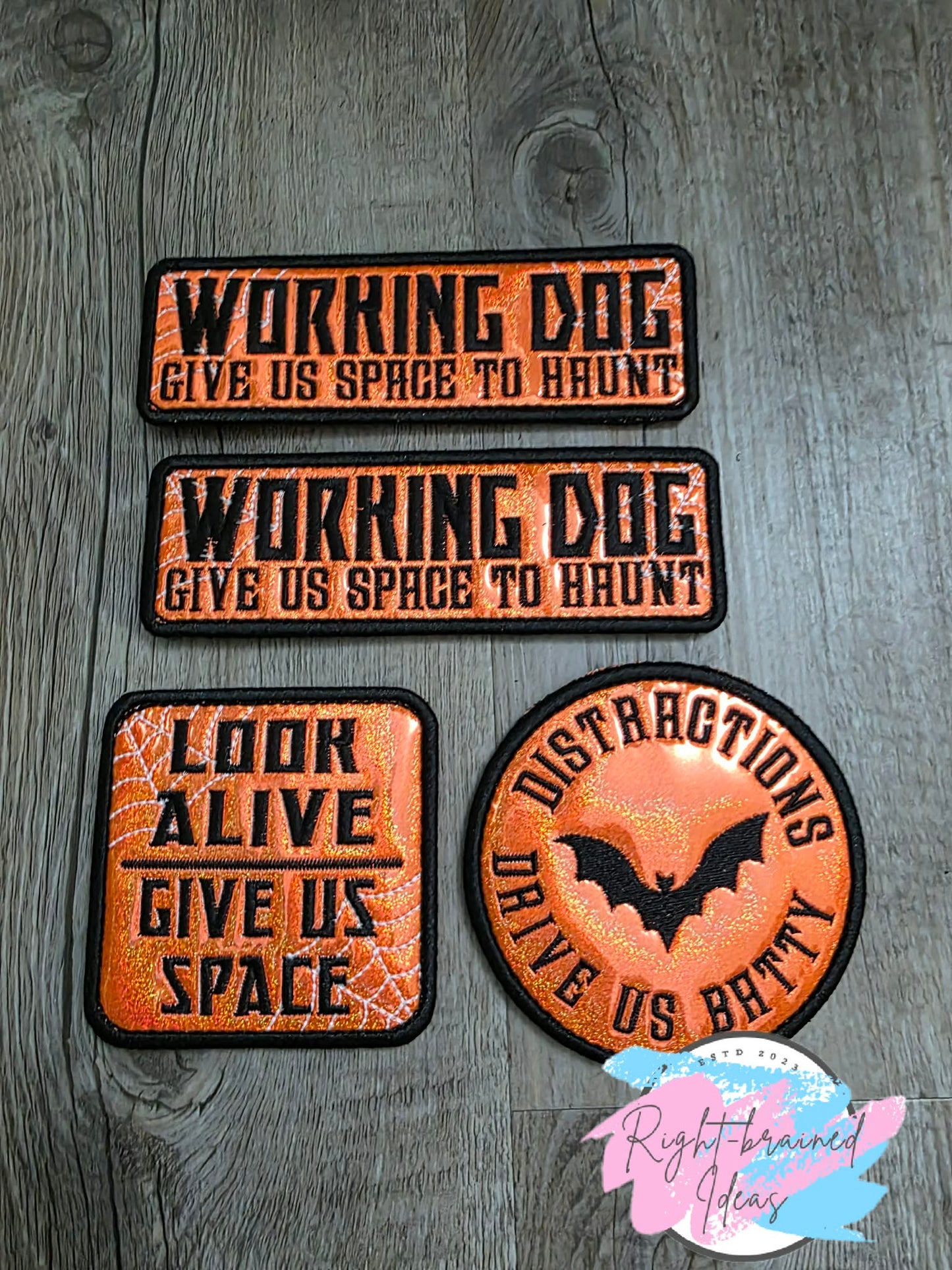 Spooky Season Inspired Working Dog Black And Glow-In-The-Dark White On Sparkle Neon Orange Holographic Vinyl Four-piece Patch Set