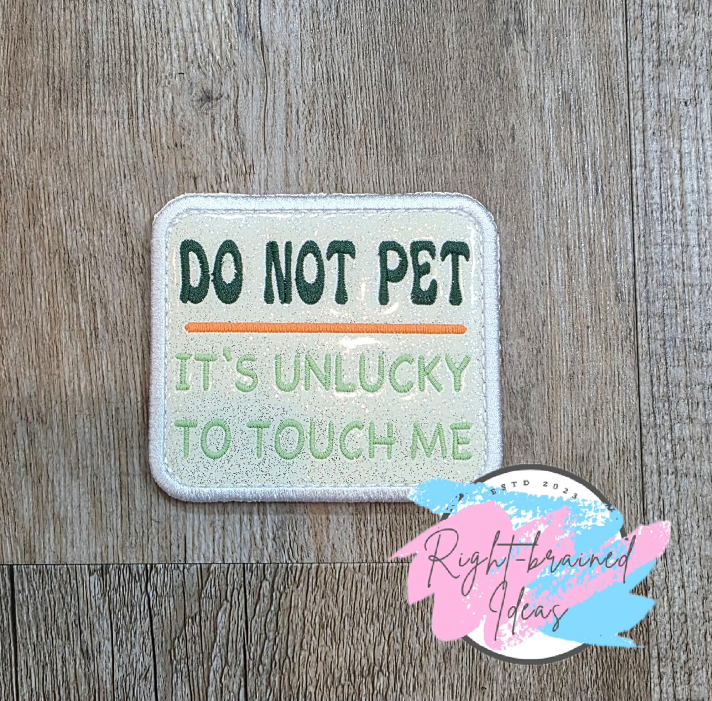 Fun Size Shamrock Inspired Service Dog Flat Matt Mint Green, Flat Matt Forest Green, Flat Matt Orange And White On Sparkle White Vinyl Four-piece