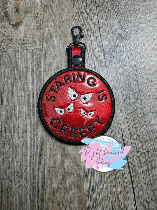 Creepy Crawly Inspired Staring is Creepy White And Black On Sparkle Red Holographic Vinyl Patch Tab