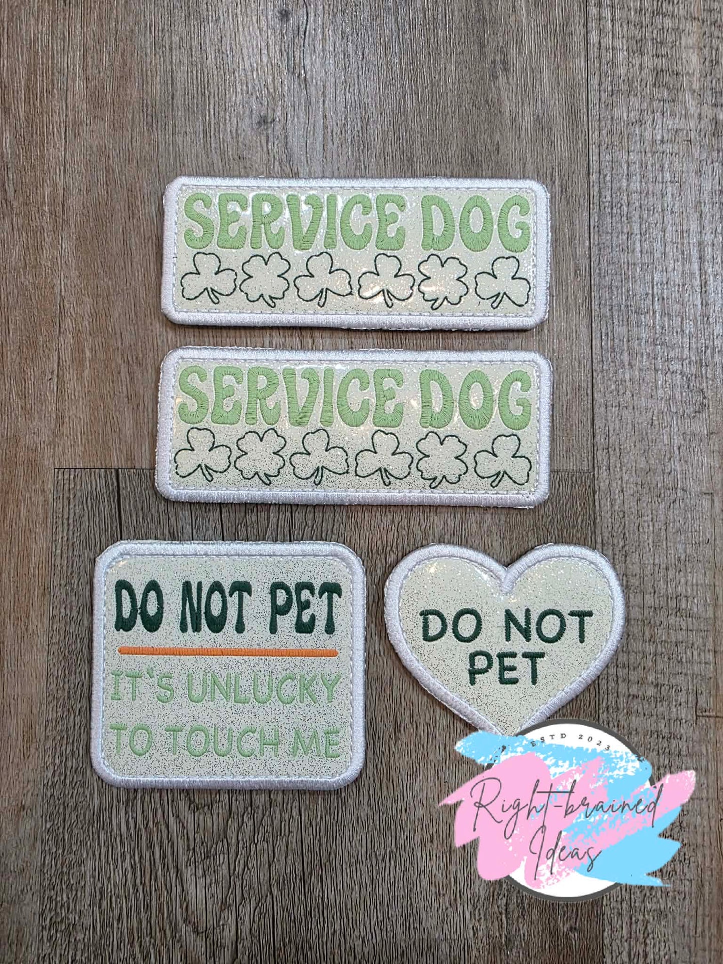 Fun Size Shamrock Inspired Service Dog Flat Matt Mint Green, Flat Matt Forest Green, Flat Matt Orange And White On Sparkle White Vinyl Four-piece