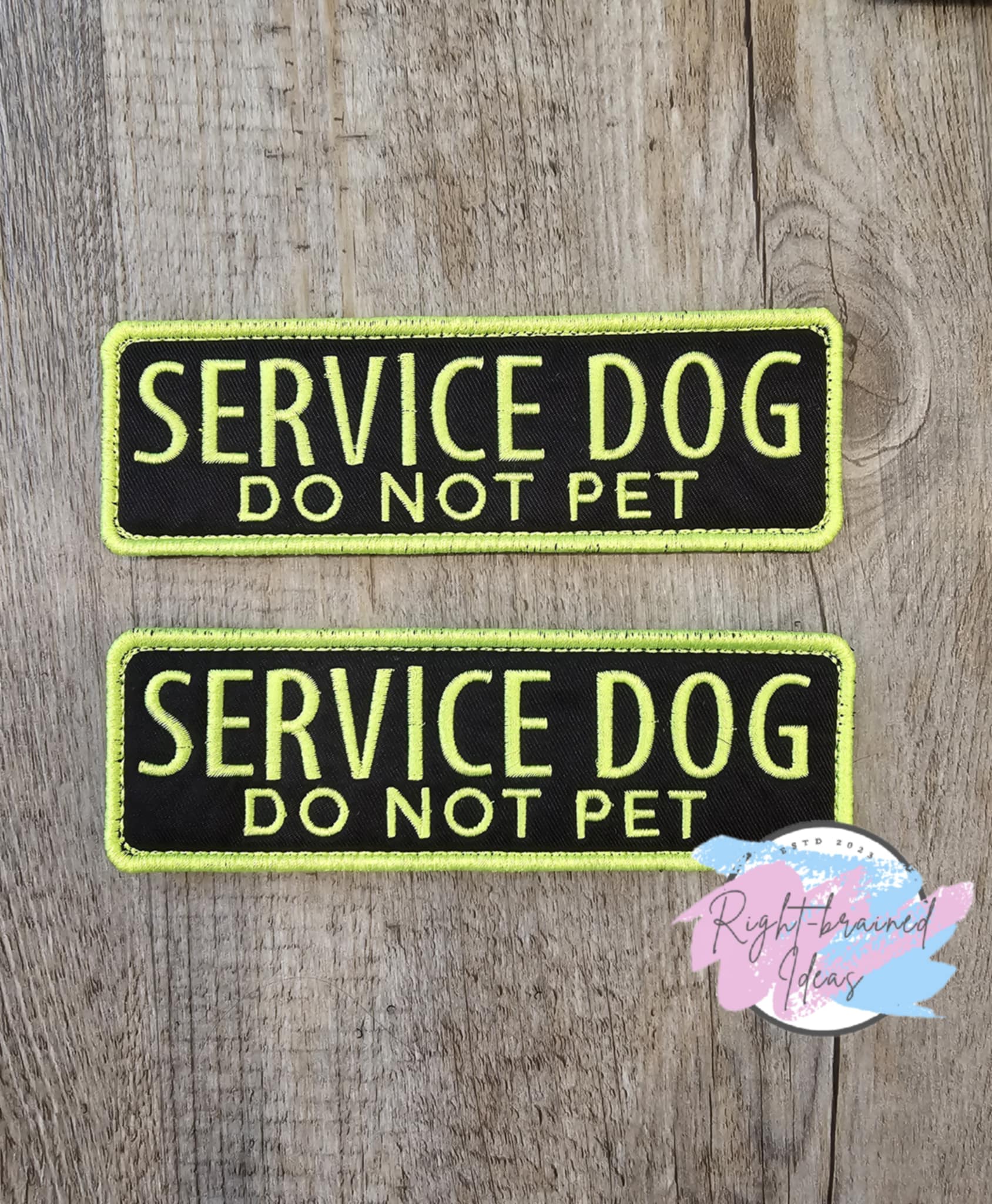 Do Not Pet Service Dog Neon Yellow on Black Canvas Rectangular Patches. This is a two-piece set that is made with black twill material and neon yellow embroidery thread to help stand out that your four-legged companion is working by telling everyone, "Service Dog, Do Not Pet." These patches come with velcro on the backside.&nbsp;

(2) 6in x 2in rectangular patches: "Service Dog Do Not Pet"